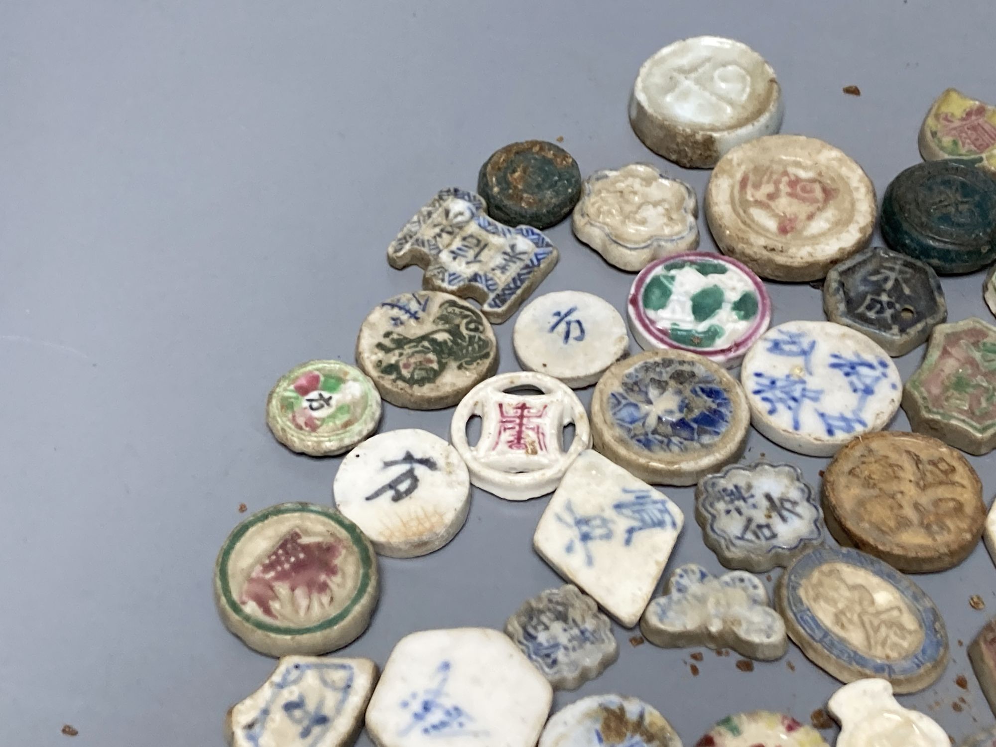 A group of Siamese porcelain gaming counters